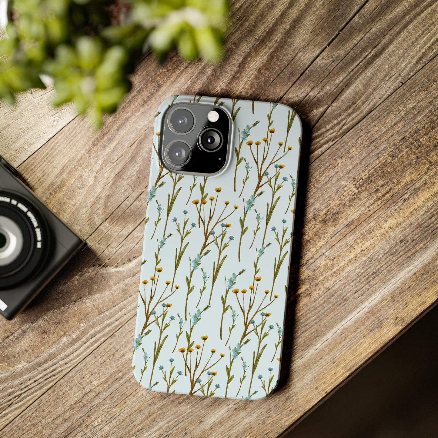 Delicate Blue and Yellow Wildflowers on a Light Blue Background Design Iphone 15-12 Slim Phone Case