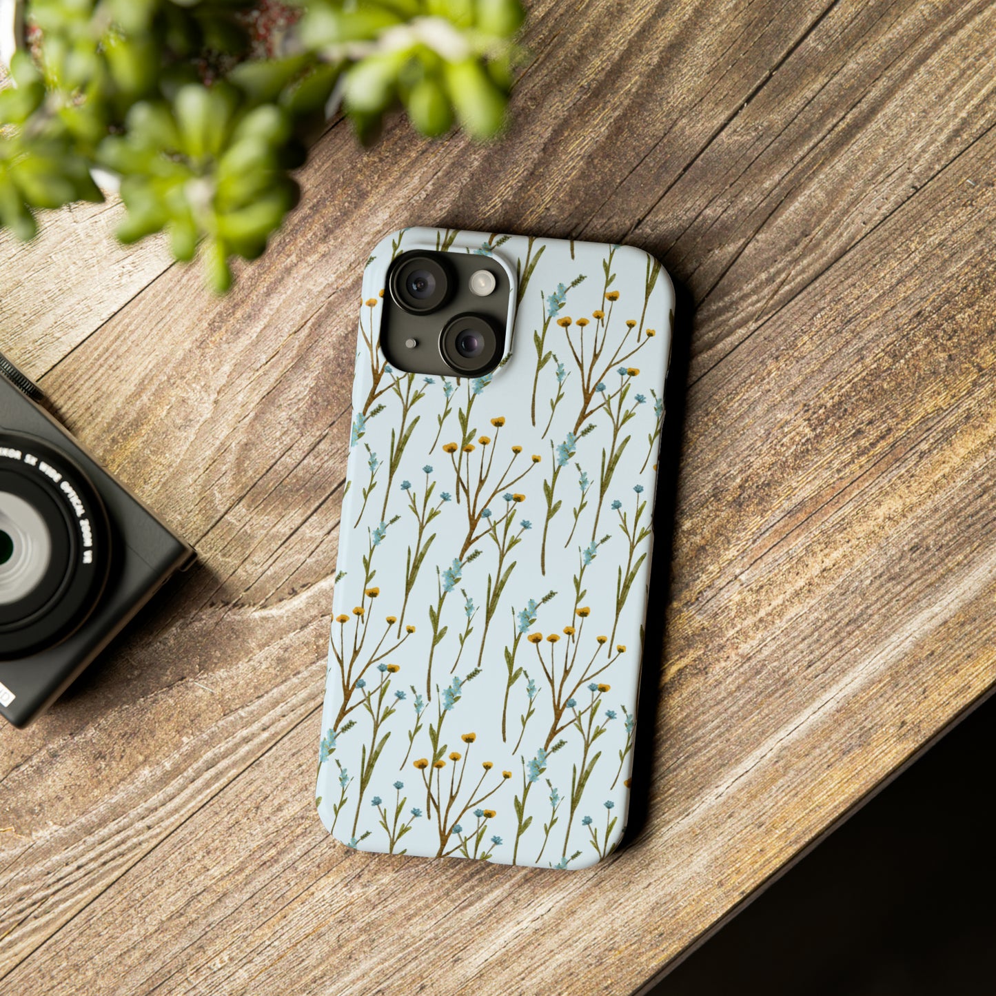 Delicate Blue and Yellow Wildflowers on a Light Blue Background Design Iphone 15-12 Slim Phone Case