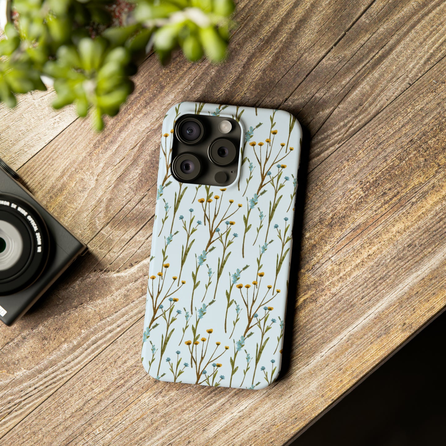 Delicate Blue and Yellow Wildflowers on a Light Blue Background Design Iphone 15-12 Slim Phone Case