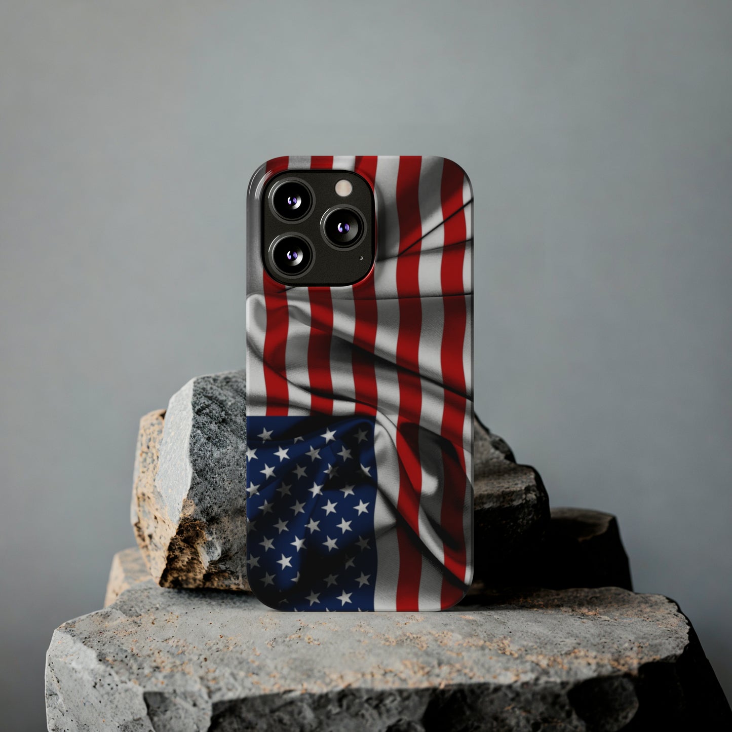 Proudly Unfurling: The American Flag Waves in Patriotic Splendor Iphone 15-12 Slim Phone Case