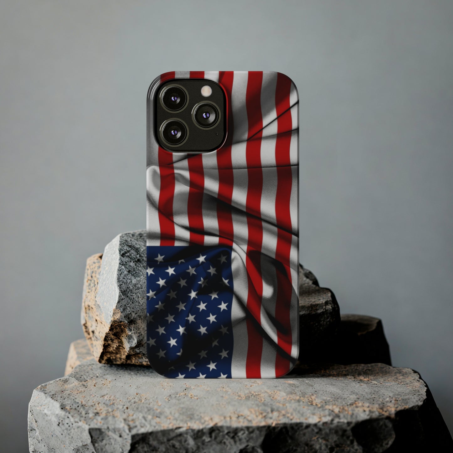 Proudly Unfurling: The American Flag Waves in Patriotic Splendor Iphone 15-12 Slim Phone Case