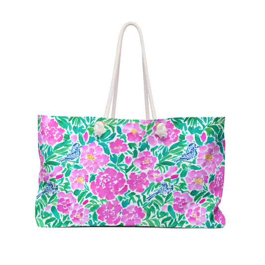 Springtime Whispers: Tiny Birds and Pink Blooms, Subtle Blue Accents, and Lush Green Leaves Oversized Weekender Bag