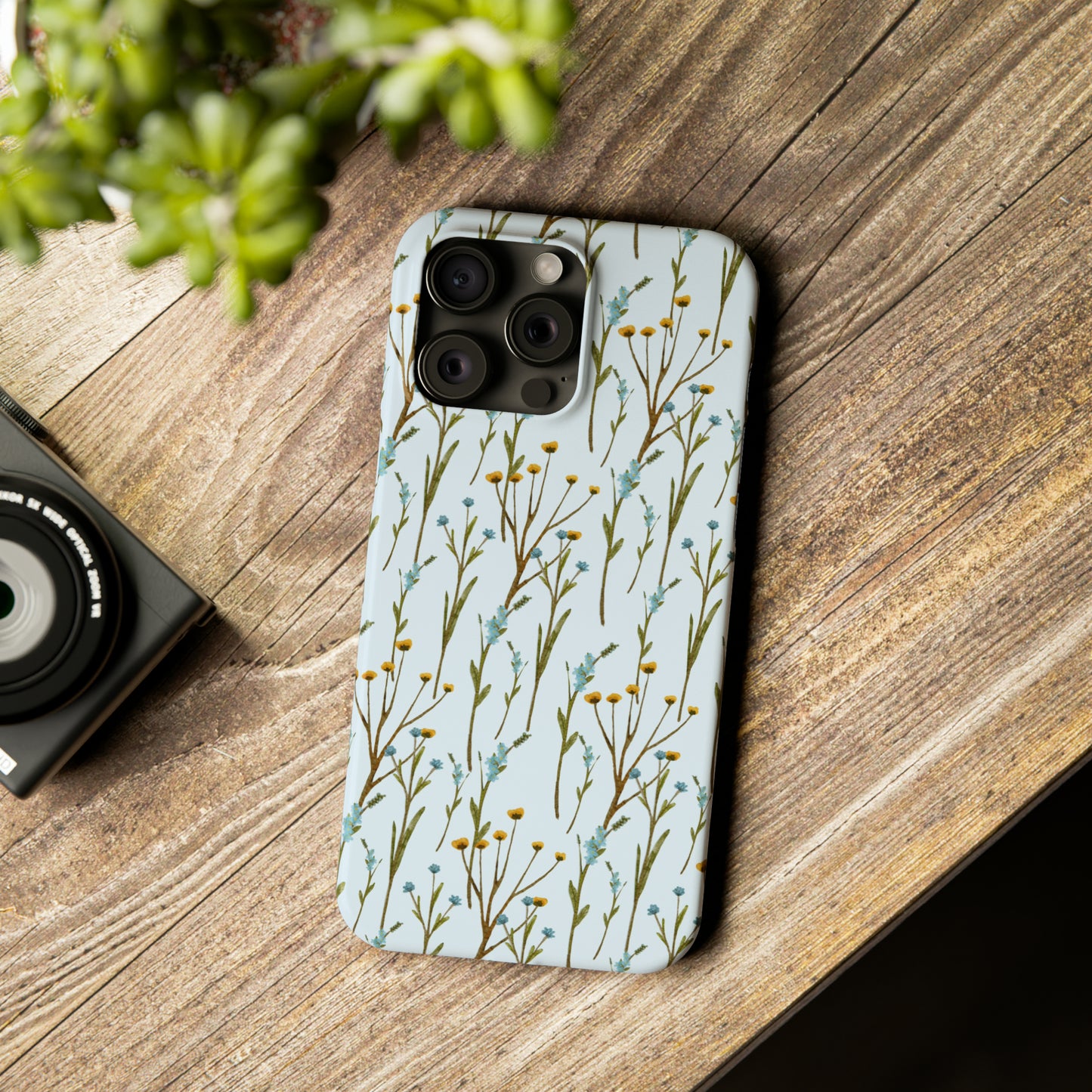 Delicate Blue and Yellow Wildflowers on a Light Blue Background Design Iphone 15-12 Slim Phone Case