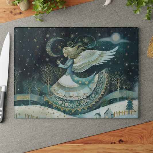 Christmas Angel in Blues and Golds, Watching Over a Starlit Village Glass Cutting Board 2 Sizes