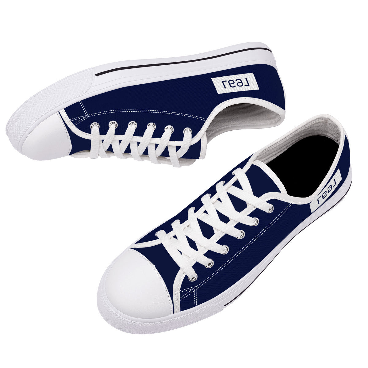 Real Logo in White on Navy Background Canvas Sneakers