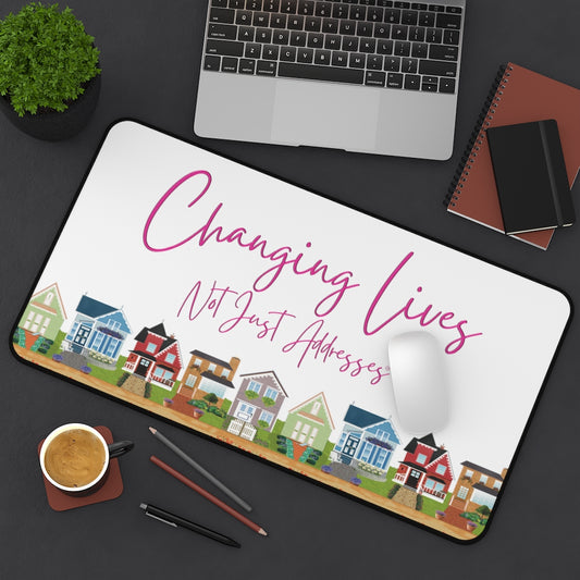 Changing Lives Not Just Addresses Pink on White Stylish Anti Slip Desk Mat in Multiple Sizes