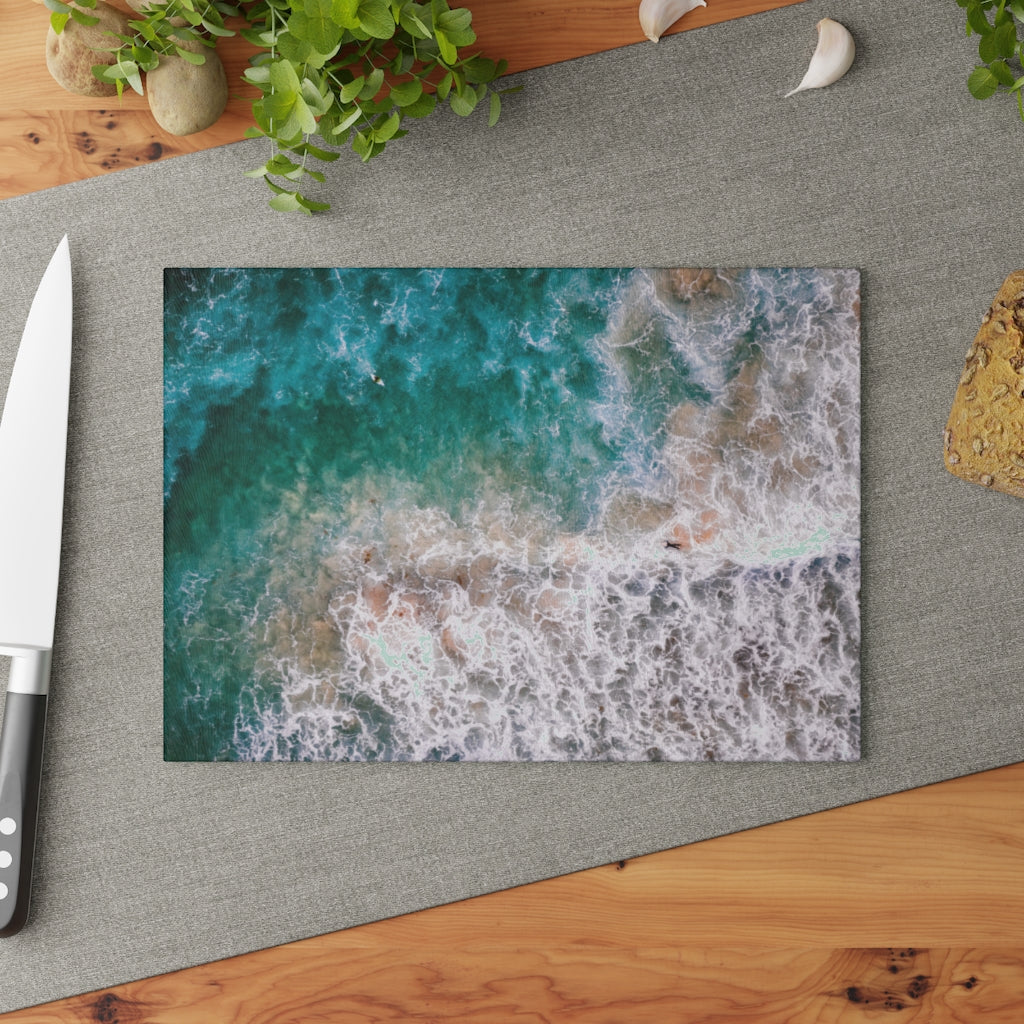 Ocean's Embrace: Deep Green Waters with White Waves Crashing onto the Beach - Glass Cutting Board  8" x 11" and 11" x 15"